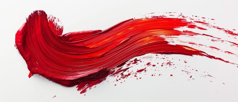 A dramatic swirl of red paint, suggesting motion and artistic flair on a pristine white background
