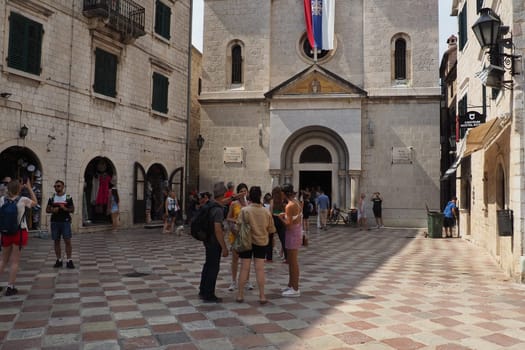 Kotor, Montenegro, August 11, 2022: The Church of St. Nicholas attracts pilgrims and tourists. Orthodox center. The architecture of the building combines elements of the Renaissance and late Gothic.