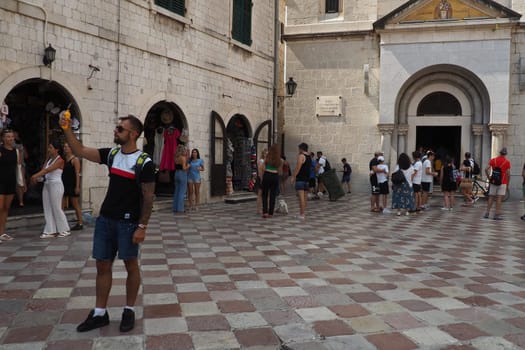 Kotor, Montenegro, August 11, 2022: The Church of St. Nicholas attracts pilgrims and tourists. Orthodox center. The architecture of the building combines elements of the Renaissance and late Gothic.