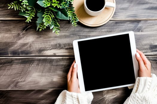 Man holding tablet computer with hands on top of it