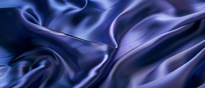Rippling azure blue satin draped in fluid waves, the light playing across the lustrous folds of the vibrant fabric