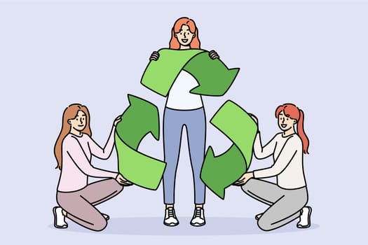 Sign of recycling in hands of women eco-activists calling to save and take care of sustainable development of environment. Symbol of recycling of materials to reduce CO2 emissions.