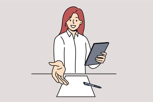 Woman recruiter welcomes new applicant to interview, extending hand to screen standing near table with contract. Girl recruiter makes job offer with high salary and health insurance