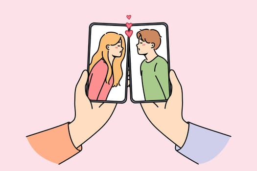 Kissing people in mobile phone screens, for concept online dating or flirting through apps in smartphones. Couple man and woman from dating site found love and started new romantic relationship