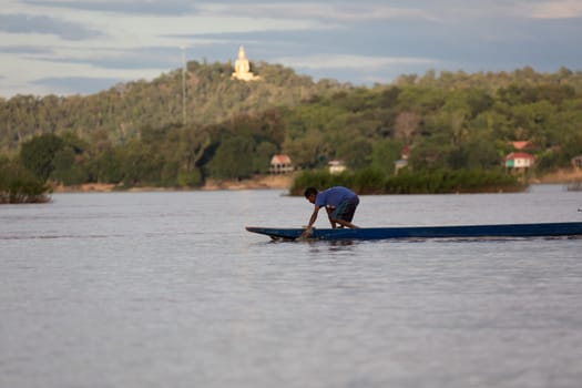 Golden giant Buddha statue on Mekong river