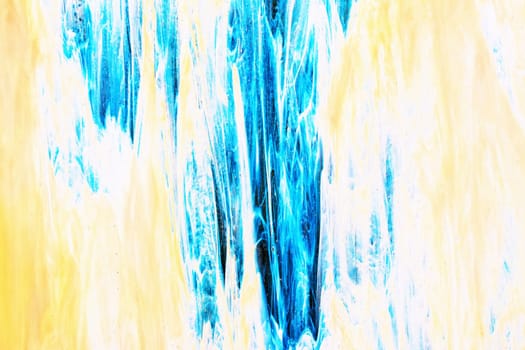 Beautiful decorative handmade creative artistic blue yellow abstract painting. Macro shot of a blue yellow background texture. Art, canvas, pattern. Watercolor paints.