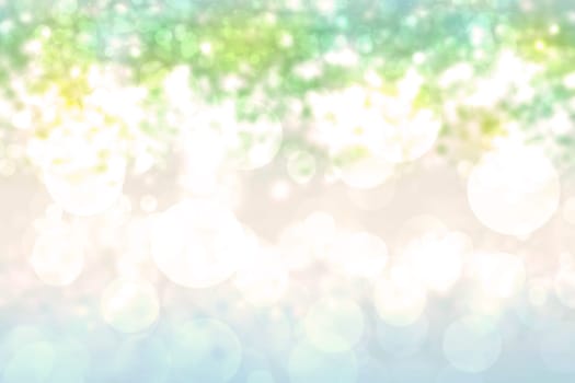 Abstract bright gradient motion spring or summer landscape texture background with natural green blue bokeh lights and yellow bright sunny sky. Beautiful backdrop with space for design.