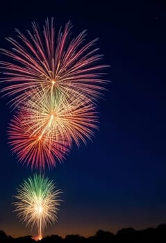 AI generated of colorful fireworks in the sky over a dark background