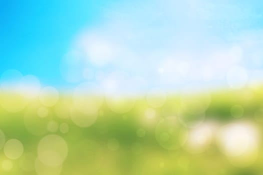 Abstract bright gradient motion spring or summer landscape texture with natural yellow green lights and blue bright cloudy and sunny sky. Autumn or summer background with copy space.