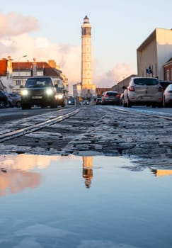 Calais, France - january 02 2023 : The lighthouse at the harbor of Calais viewed from the ground, north of France