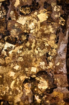 Close Up Of Gild Texture On Gold Wood Buddha Statue Background.