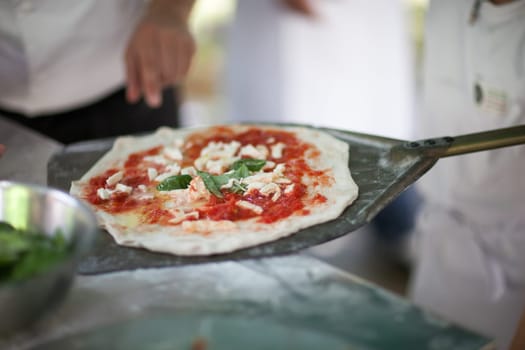 Neapolitan pizza that is going to be fired