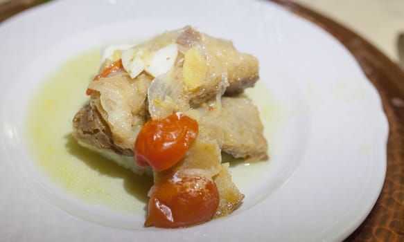 dish of salt cod in low-temperature frying