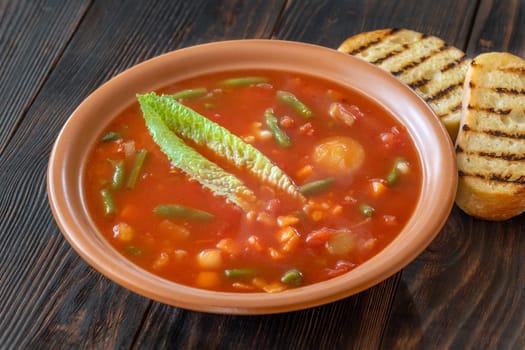 Portion of Minestrone soup made with vegetables and stock