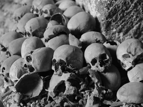 Skull and bones in ancient ossuary, Naples