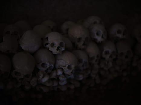 Skull and bones in ancient ossuary, Naples