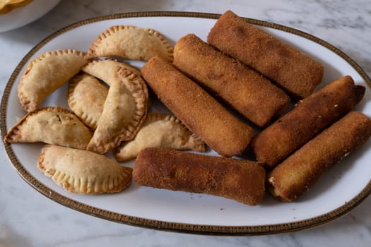 Sri Lankan rolls and samosas homemade  filled with chickemn, curry and tuna