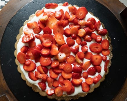 strawberry cake on wooden background, selective focus