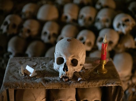 Skull and bones in ancient ossuary, Naples