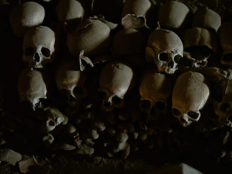 Skull and bones in ancient ossuary, Naples