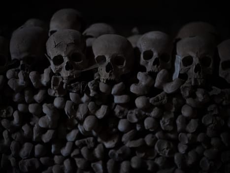 Skull and bones in ancient ossuary, Naples