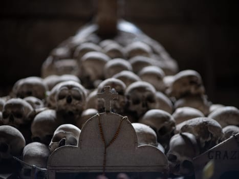 Skull and bones in ancient ossuary, Naples