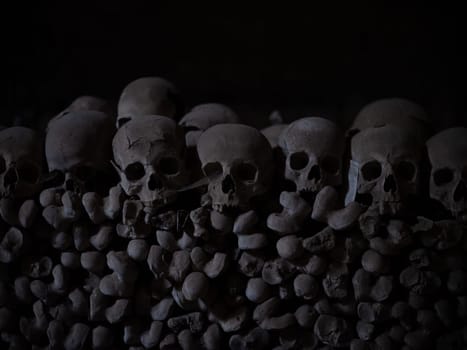 Skull and bones in ancient ossuary, Naples