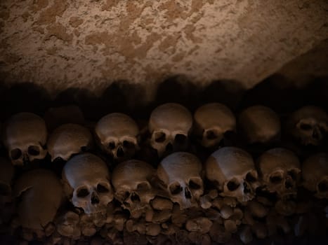 Skull and bones in ancient ossuary, Naples