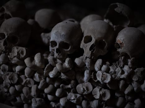 Skull and bones in ancient ossuary, Naples