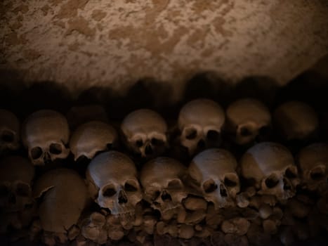Skull and bones in ancient ossuary, Naples