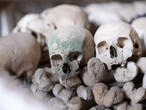 Skull and bones in ancient ossuary, Naples