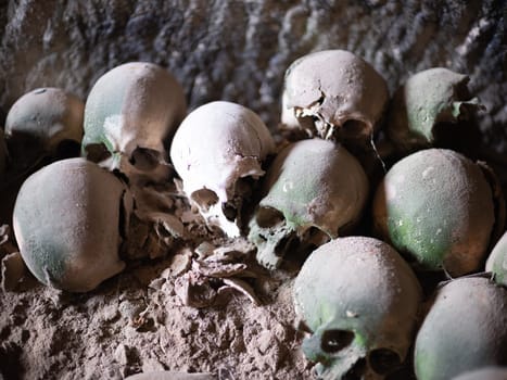 Skull and bones in ancient ossuary, Naples