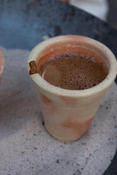 Preparation of desert arabic coffee on hot sand