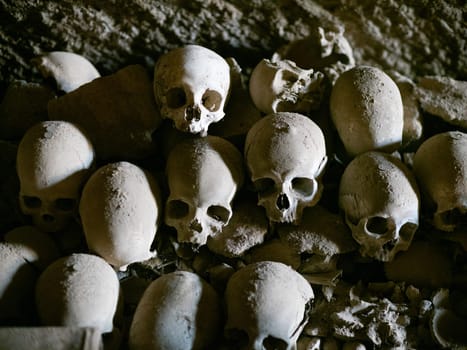Skull and bones in ancient ossuary, Naples