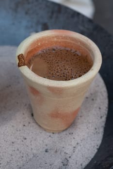 Preparation of desert arabic coffee on hot sand