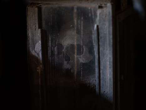 Skull and bones in ancient ossuary, Naples