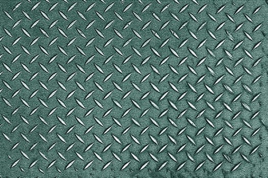 Background texture of a metallic green surface with an oblique dash pattern