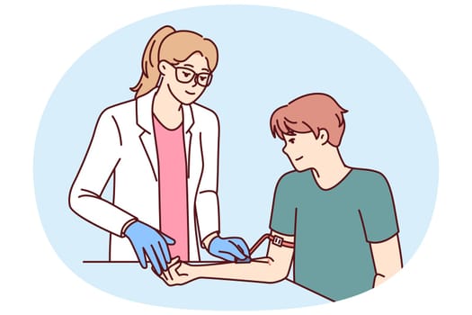 Woman doctor preparing patient for blood test to check for diseases or DNA test. Man patient donates plasma from arm sitting in clinic, wanting to help those in need of blood transfusion