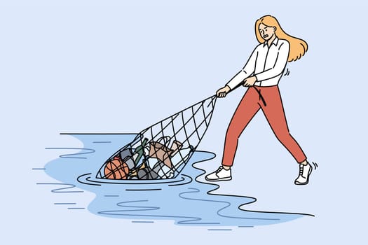 Woman environmental activist pulls trash out of ocean as she tries to tackle problem of environmental pollution on own. Girl takes care of environment and calls for reducing use of plastic.
