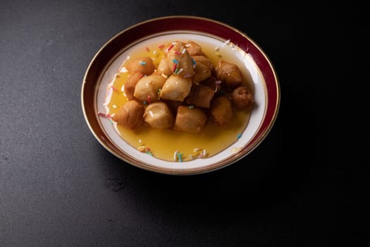 Struffoli - Traditional Neapolitan Dessert Served at Christmas. Honey Glazed, Fried