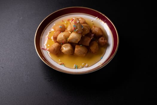 Struffoli - Traditional Neapolitan Dessert Served at Christmas. Honey Glazed, Fried