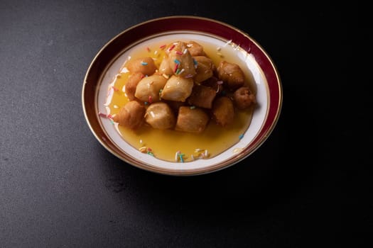 Struffoli - Traditional Neapolitan Dessert Served at Christmas. Honey Glazed, Fried