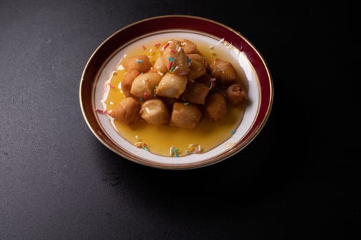 Struffoli - Traditional Neapolitan Dessert Served at Christmas. Honey Glazed, Fried