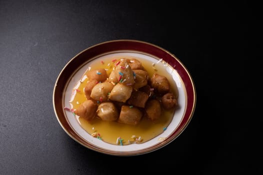 Struffoli - Traditional Neapolitan Dessert Served at Christmas. Honey Glazed, Fried