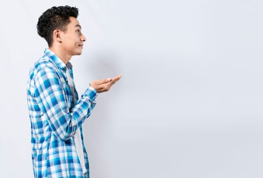 Man recommending an advertisement with the palm of his hands. Guy recommending an ad space isolated, Smiling person recommending a product with his hands
