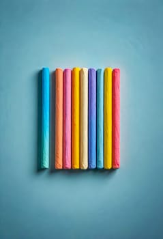 AI generated of a row of colorful chalk sticks are lined up on a blue background