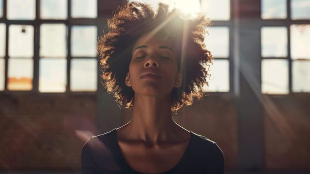 A woman standing in front of windows, her eyes closed. She is peacefully taking a moment of quiet reflection, bathed in soft light filtering through the glass panes.
