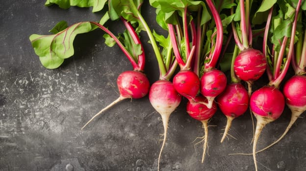A group of radishes displayed neatly on a wooden table. The radishes are vibrant red in color with green leaves attached. They are placed in rows, creating a visually appealing arrangement.