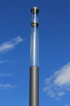 a street lamp with Led technology, blue sky in the background