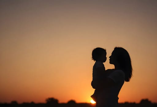 AI generated of a mother and her child are silhouetted against a sunset sky